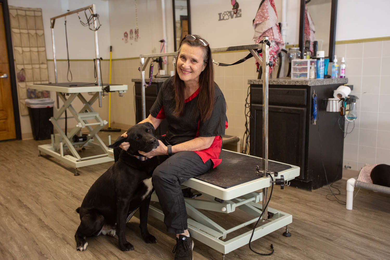 WOMAN’S BEST FRIEND: Charlene Smith, pictured with rescue foster dog Joe, is set to make facade upgrades at Doggie Styles Grooming in Nixa.